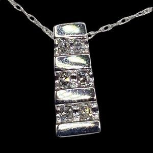10k gold genuine 6 diamond pendant 16” chain marked yesterday today tomorrow